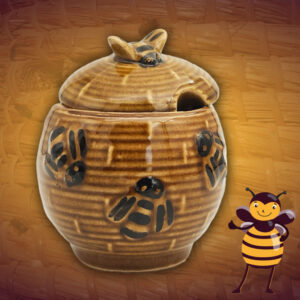 Dit kleine keramische honingpotje in de vorm van een bijenkorf is gemaakt van bruin aardewerk. De bijtjes die op dit potje honing zitten maken het presenteren van honing extra leuk.